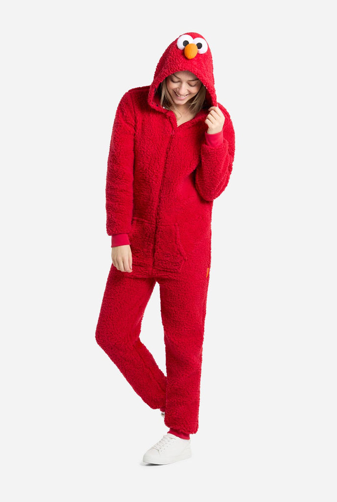 Woman wearing red pluche Elmo onesie for adults