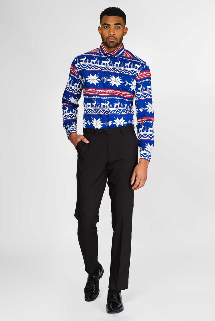 Man wearing blue dress shirt with Nordic Christmas theme