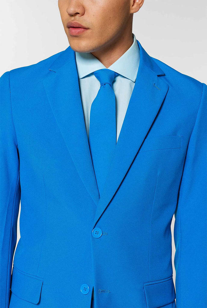 Man wearing blue men's suit