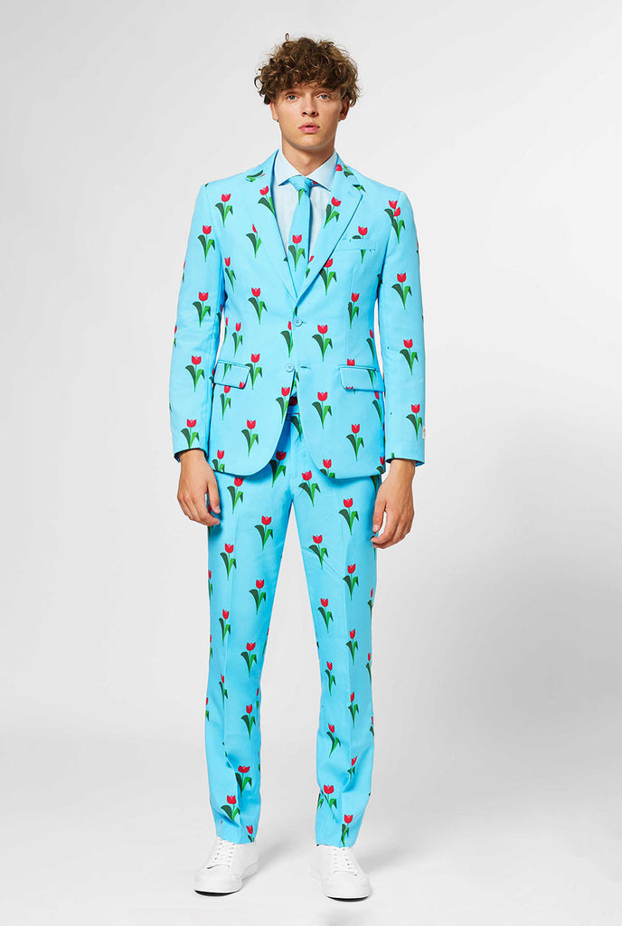 Man wearing light blue men's suit with tulips print