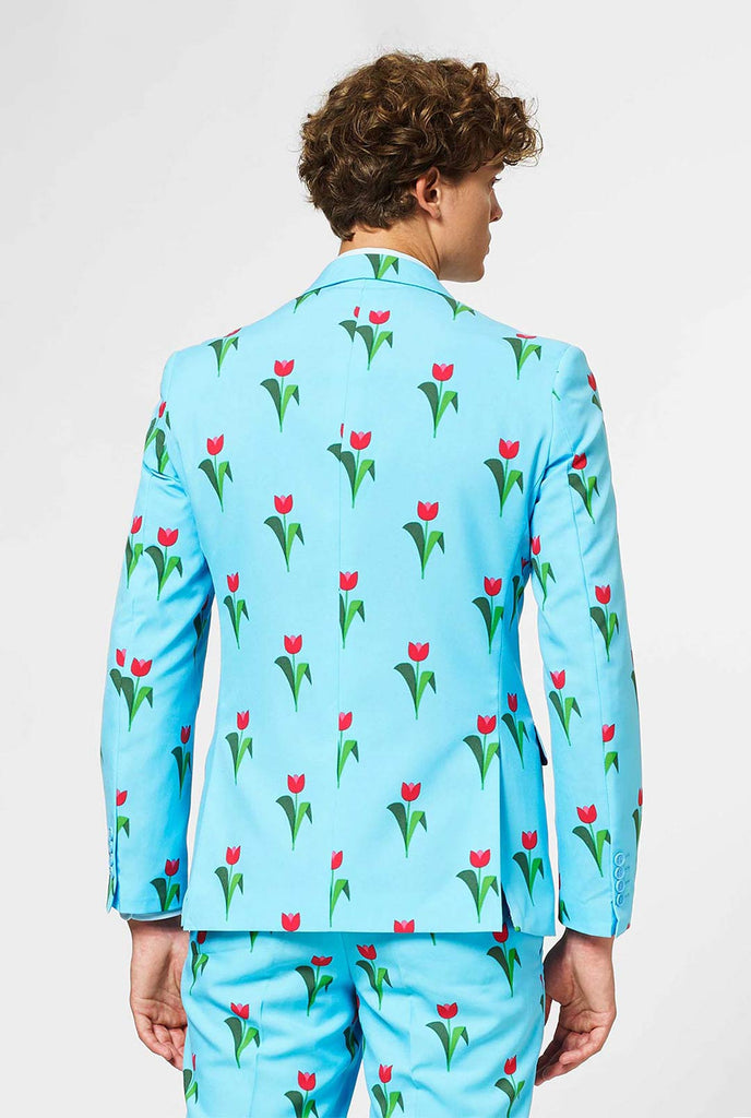 Man wearing light blue men's suit with tulips print