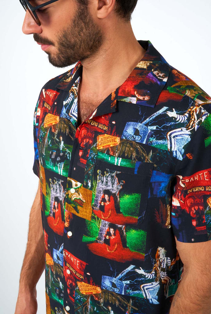 Man wearing Hawaiian shirt with Beetlejuice print, close up