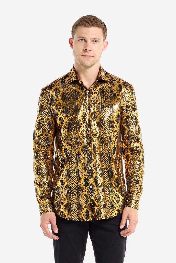 This image showcases a men’s dress shirt from OppoSuits, featuring a striking gold and black snakeskin print pattern. The shirt’s fabric has a glossy finish that reflects light, creating a bold, high-fashion look perfect for making a statement. With a detailed reptile-inspired pattern, this shirt is ideal for anyone looking to bring some edgy style to their wardrobe.