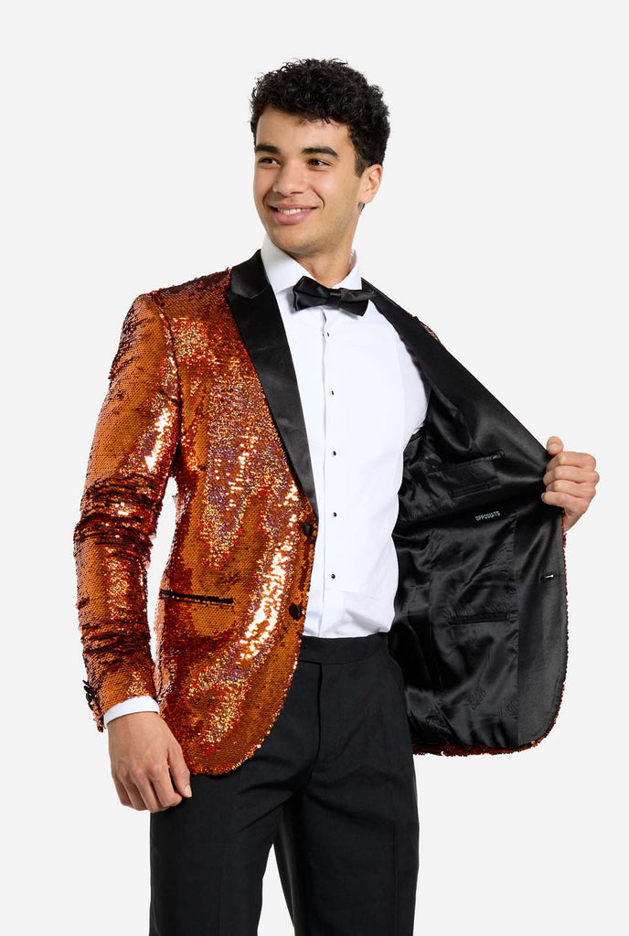 Men wearing tuxedo with orange sequins jacket