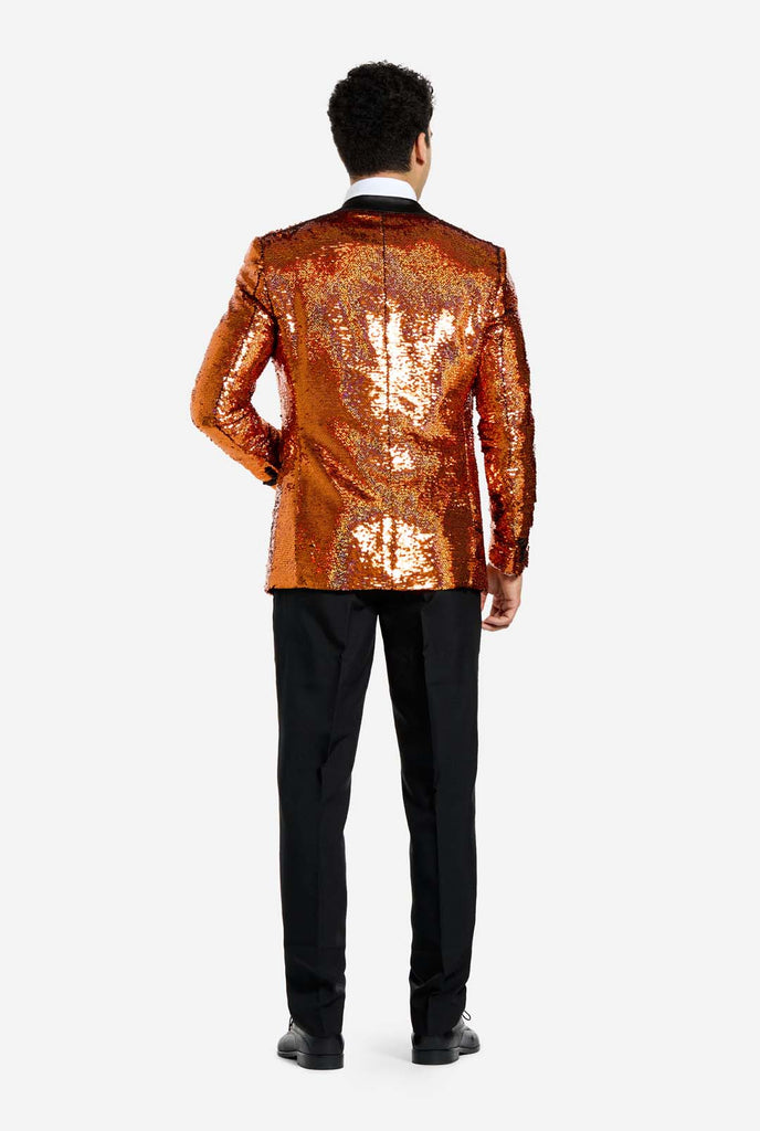 Men wearing tuxedo with orange sequins jacket, view from the back