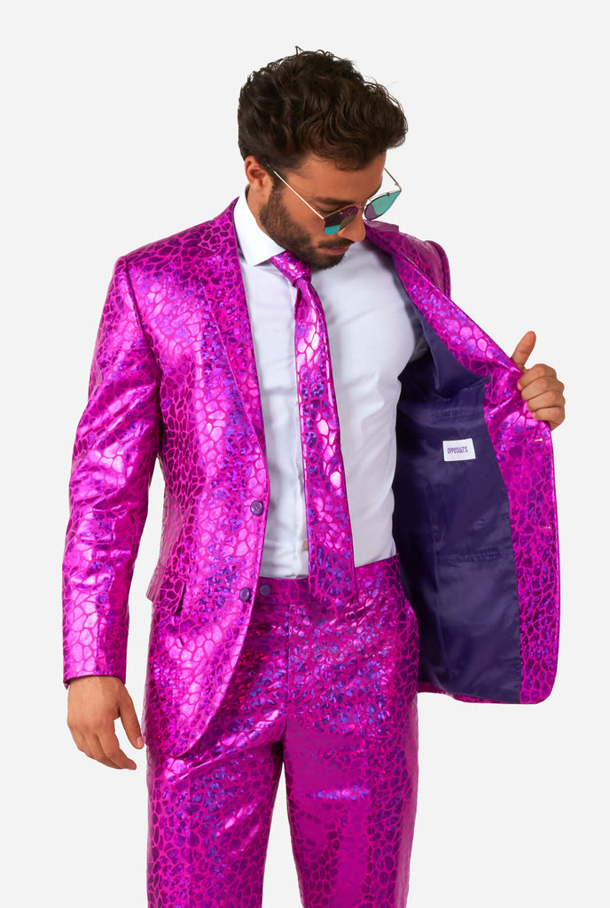 Man wearing shiny pink lizard skin men's suit