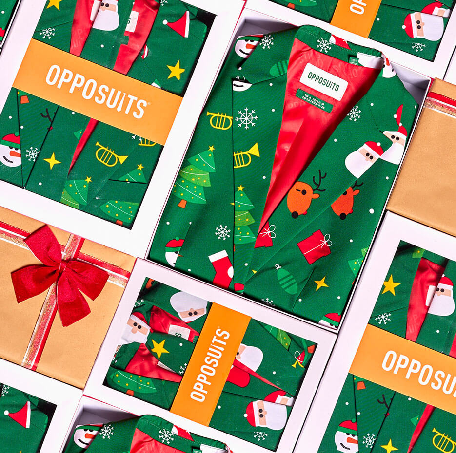 image of the green suit of the Festivity Christmas outfit collection. Retail boxes aligned next to each other as a puzzle.