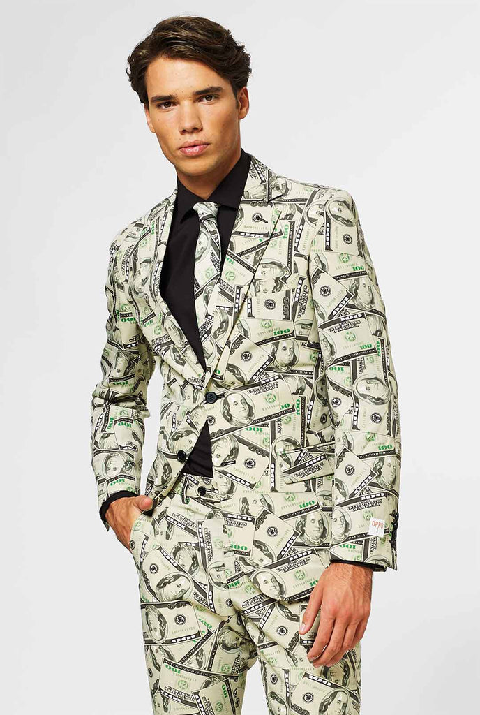 Video of a man wearing Cashanova men's suit with dollar, money print