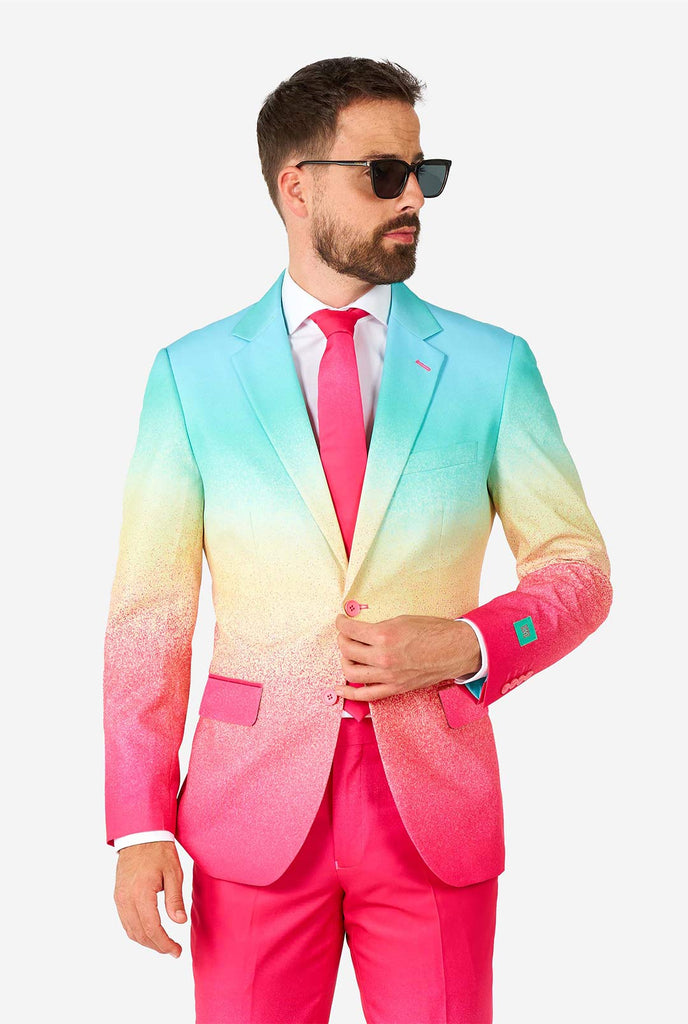 Video of man wearing Funky Fade rainbow colored suit