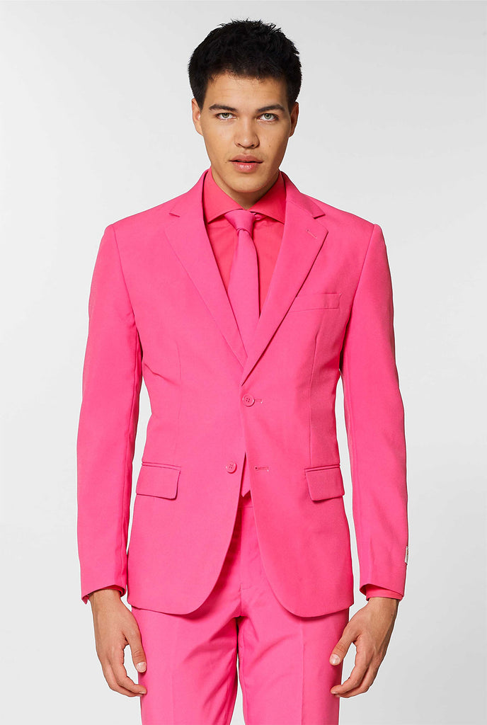 Video of man wearing pink men's suit and dress shirt