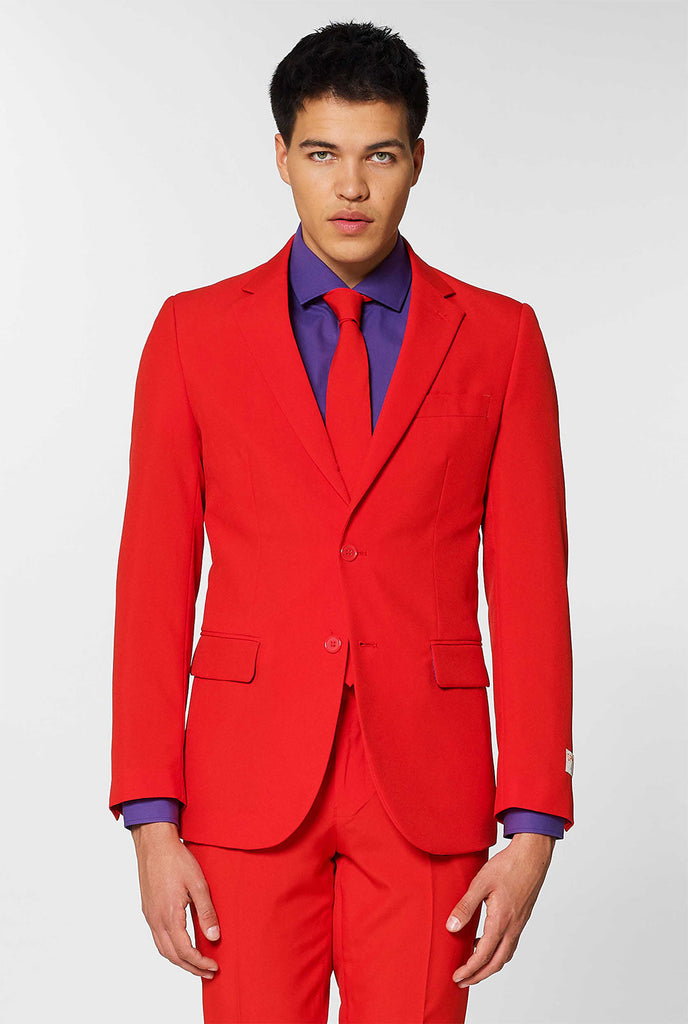 Video of man wearing red men's suit with dress shirt 