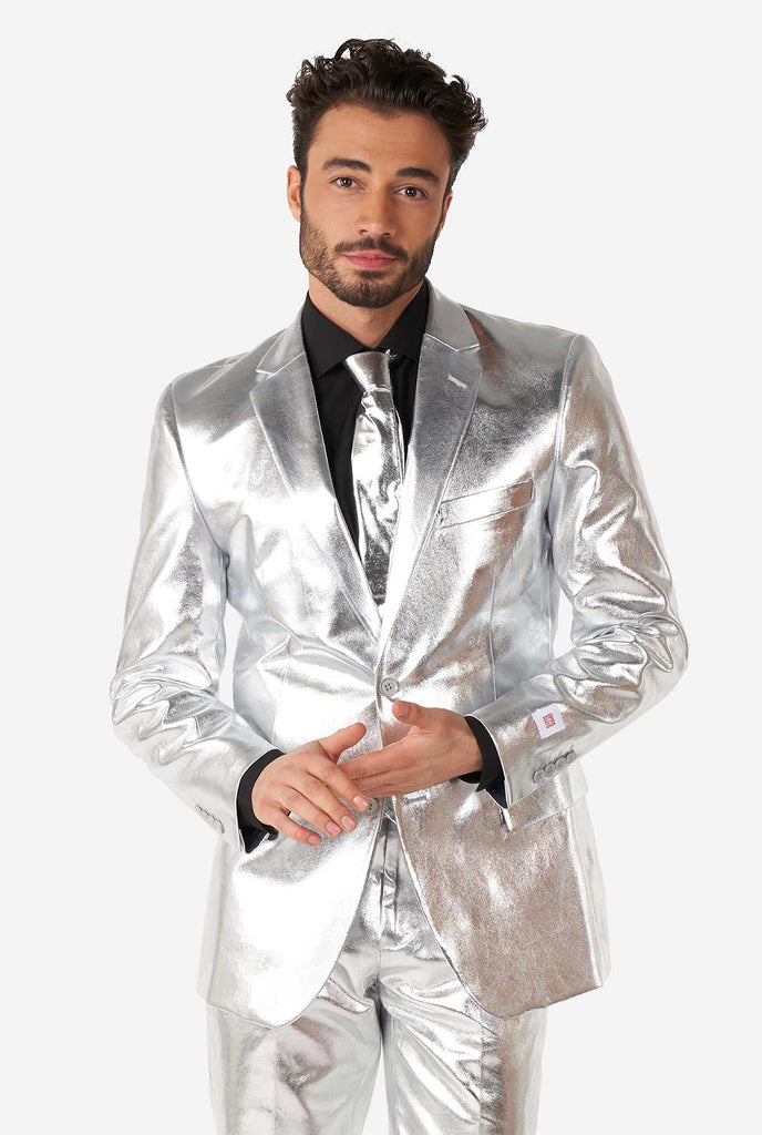 Video of man wearing shiny silver suit 